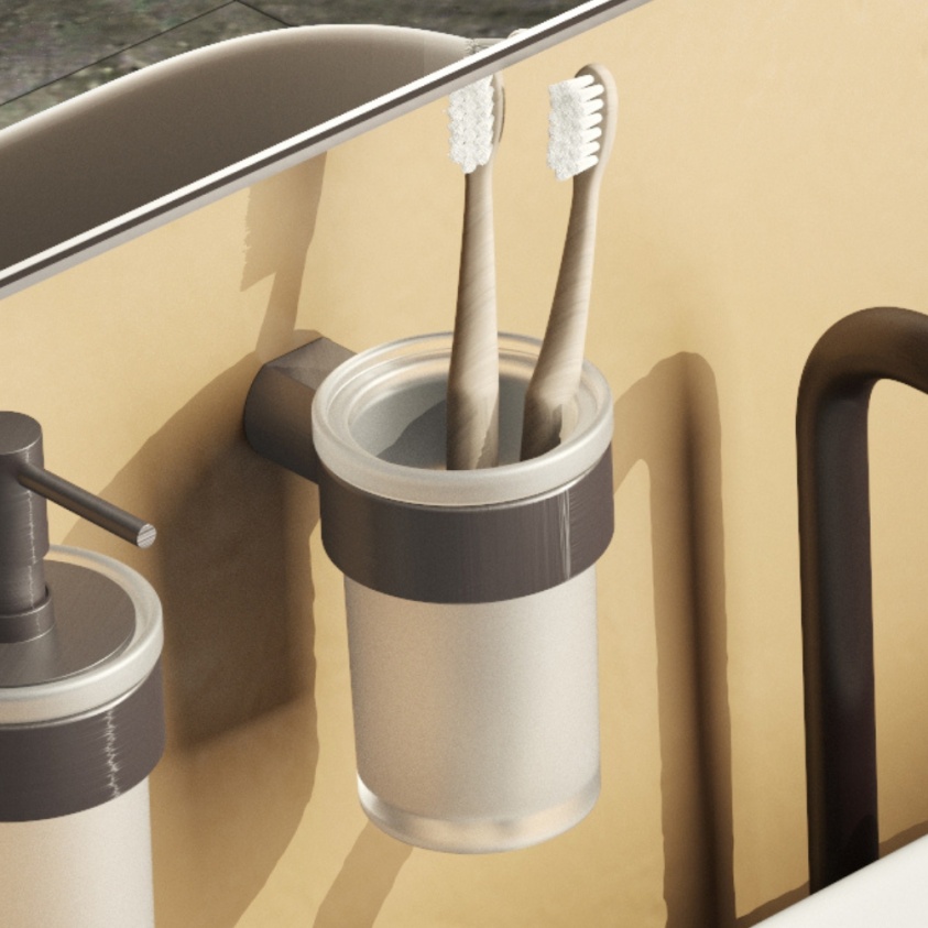 product lifestyle image of Origins Living Pirenei Gunmetal Tumbler Holder mounted on a wall with toothbrushes in it PI10-81